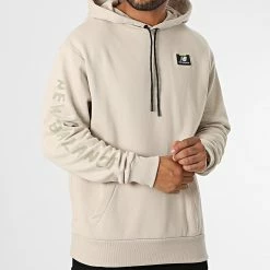 Coupon 💯 Sweat Capuche MT23506 Beige de New Balance ✔️